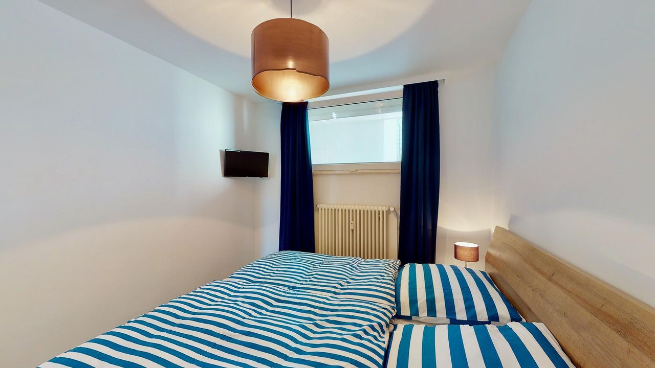 Seeluft 34, Schlafzimmer mit TV (2) Seeluft 34, Schlafzimmer mit TV (2)